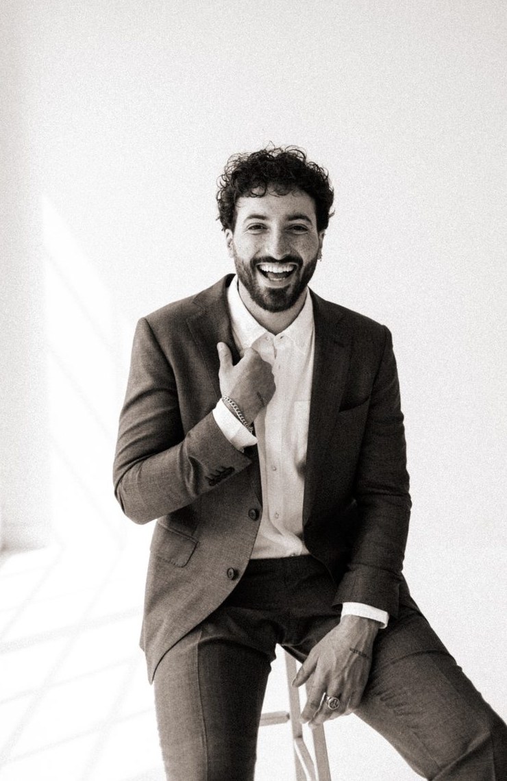 Smiling man in a James suit